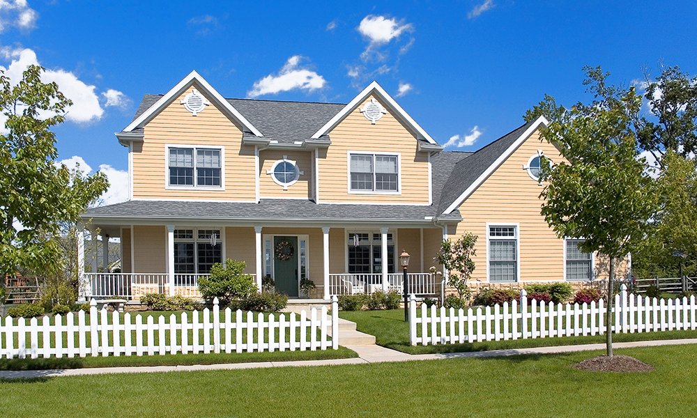Beautiful suburban home with white picket fence